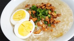 Lugaw Filipino Rice Breakfast (Rich Porridge with Hard-Boiled Egg and Chopped Spring Onions)