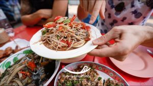 Som Tum Street Food in Thailand Spicy green papaya salad Street Food in Thailand