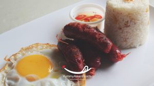 Longsilog Filipino Rice Breakfast (Longganisa, Sinangag at Itlog) Longganisa with garlic fried rice and sunny-side-up egg