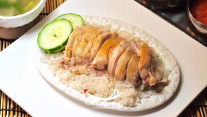 Cooking Hainanese Chicken Rice Step 4 Serve and Enjoy Slice chicken, plate with rice and sauces